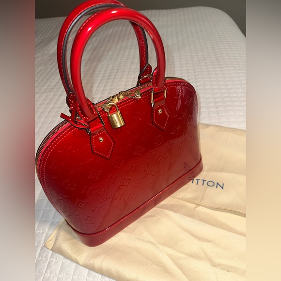 Beautiful red patent classic bag with beautiful brass hardware and details. - Picture 1 of 8